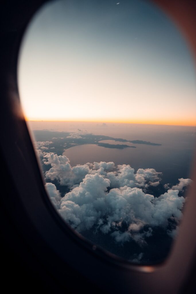 a view of the clouds from an airplane window